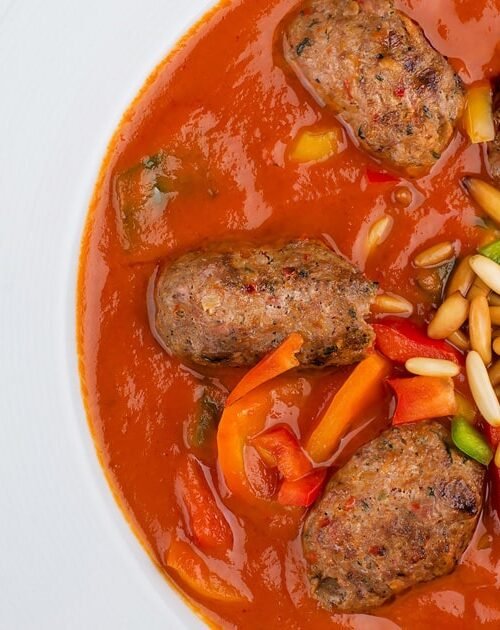 Involtini di agnello al sugo